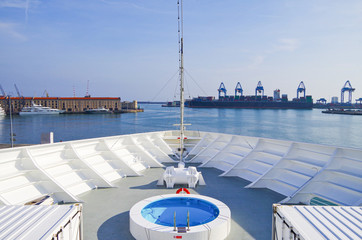 Panoramic view over bow of MSC Cruises cruiseship or cruise ship liner with railing and whirlpool...