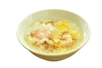 rice porridge with egg yolk dressing sot sauce on bowl