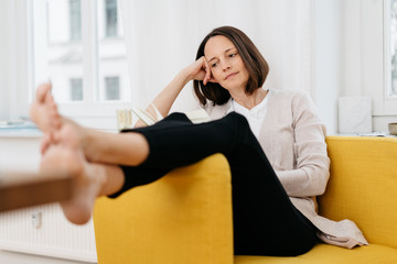 Woman immersed in reading her book