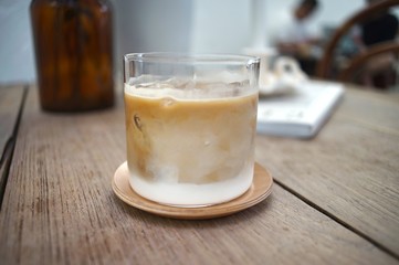 Iced Latte coffee in a grass
