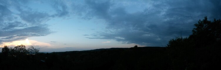 colorfully stormy clouds at sunset