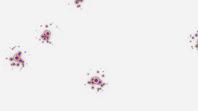 The camera observes from above how quickly the groups of anodized balls move. Cell division. Seamless loop.