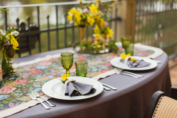 restaurant terrace decorated and table served with flowers and candles for wedding romantic dinner  