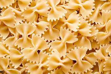 Heap of raw farfalle or bow tie pasta
