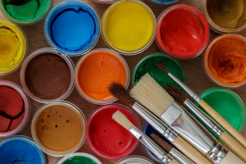 open jars with colored gouache