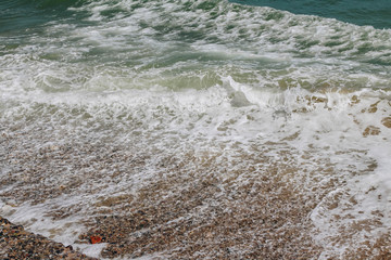 Beautiful waves on the shore of the central beach of Nha Trang, Vietnam.