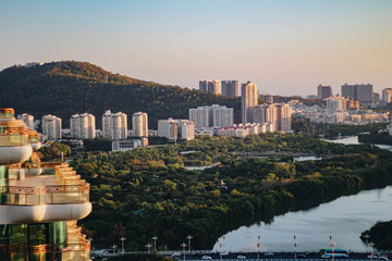 Cityscape at sunset in the city of Sanya. Hainan island