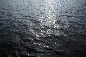 sun sparkling on water surface, Lappeenranta Finland