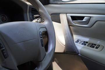 Obraz na płótnie Canvas Old car interior, steering wheel, gear lever and control panel 