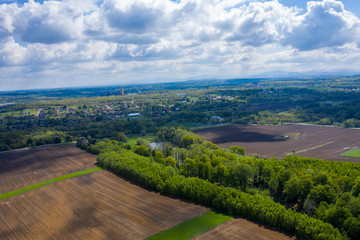Fototapeta na wymiar aerial view of Stonava village in Czech in spring, with beautiful sky
