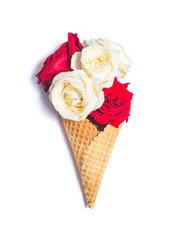 Waffle cone with roses on white background