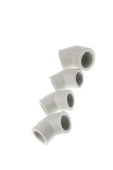 Set of different plastic PPR elbow fitting for water pipes, isolated on white background