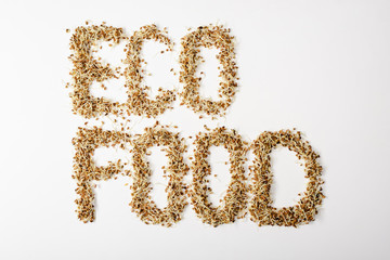 top view of eco food lettering made of sprouts on white background