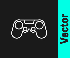 White line Gamepad icon isolated on black background. Game controller. Vector Illustration