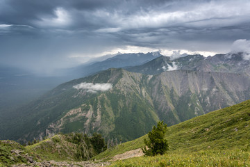 Fototapeta premium wooden fence in the valley with mountains, Arshan, Tunka valley