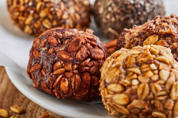 Healthy Organic Energy balls Muesli Bites with Nuts, Cocoa, Chia and Honey - Vegan Vegetarian Raw Snacks or Food. copy space. Close-up