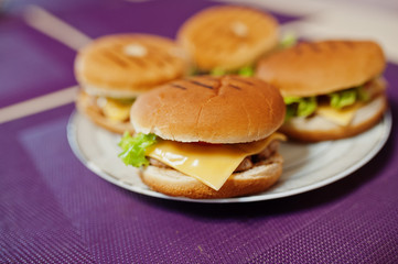 Сooking burgers in the kitchen at home during quarantine time.