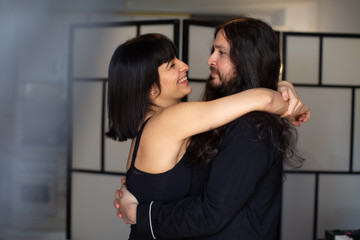 long hair couple love at home in pijama