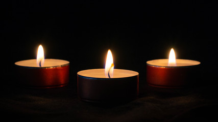 Three small candles