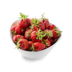 Fresh strawberry in white bowl isolated on white. Close-up.