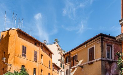 Fototapeta na wymiar Blue sky over colorful facades in Rome