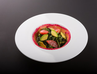 Smoked salmon salad with arugula, grapefruit and avocado