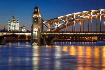 Fototapeta na wymiar Bolsheokhtinsky bridge over the Neva river in Saint Petersburg at night