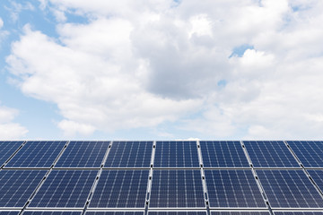 wide view of solar panels on sky background