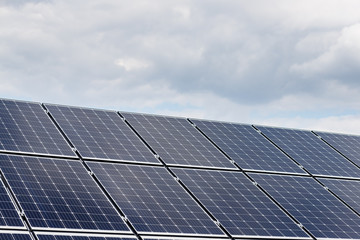 close-up view of solar panels on a background of blue sky