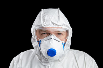 Doctor in white protective suit and respirator and glasses