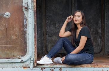 street fashion wearing asian girl in sitting