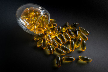 Fish oil capsules in fish shape