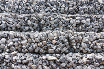 stone wall defence falling soil mountain background strong protect road from slide soil