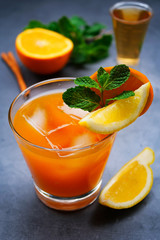 Glass of Scotch Whiskey orange juice alcohol cocktail