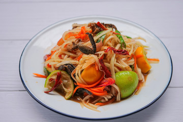Thai food (Som Tum), spicy green papaya salad