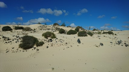 sand dunes and clouds