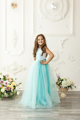 Fototapeta premium Little girl child in a fashionable dress