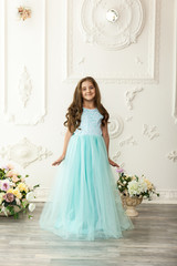Fototapeta premium Little girl child in a fashionable dress