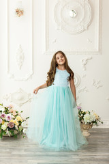 Fototapeta premium Little girl child in a fashionable dress