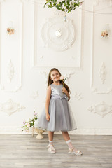 Little girl child in a fashionable dress