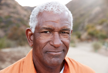 Outdoor Portrait Of Serious African American Senior Man With Mental Health Concerns