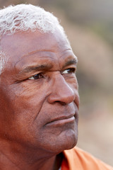 Outdoor Portrait Of Serious African American Senior Man With Mental Health Concerns