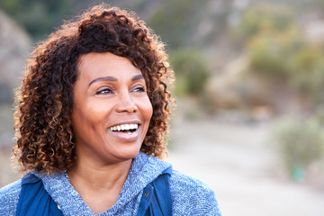 Portrait Of Smiling African American Senior Woman Outdoors In Countryside