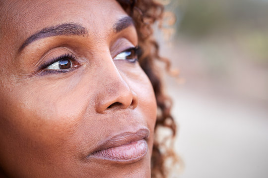 Outdoor Portrait Of Serious African American Senior Woman With Mental Health Concerns