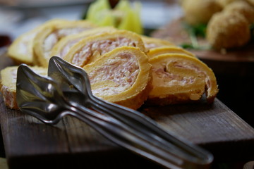 Roll with ham and Russian salad close up shot,  food at a high category hotel, all inclusive menu