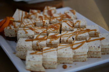 chocolate cakes with cream and strawberry topping, traditional cakes, domestic cakes cake on a plate, domestic cakes