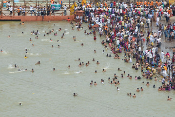 Kumbh mela gathering in Nasik as a huge crowd bathes in river Godavari