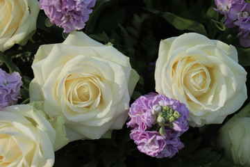 White and purple wedding centerpiece