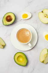 breakfast of coffee, avocado and apples
