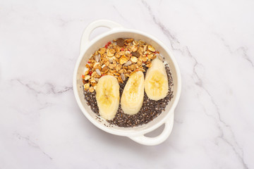 smoothie bowl with chia, banana and granola
